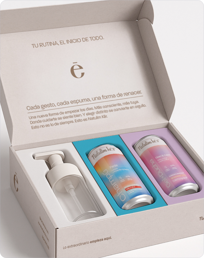 Kēr packaging — open, showing dispenser and refill cans